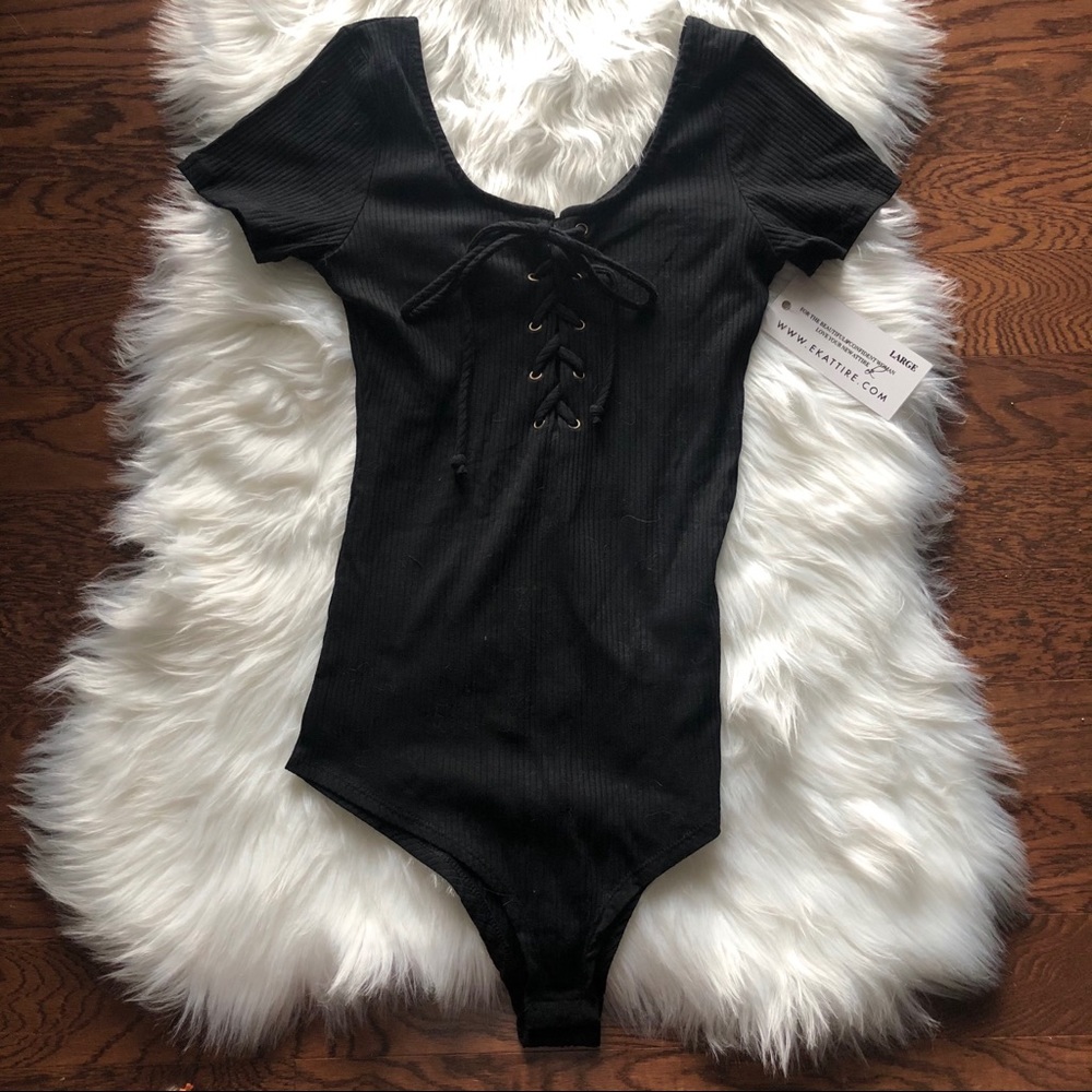Adorable ribbed bodysuit with a tie up front